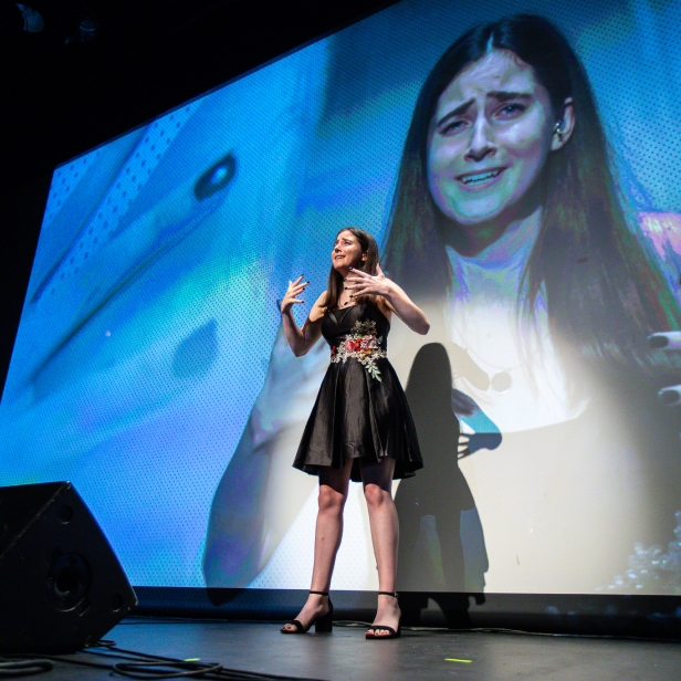 Danny Award recipient Erin Rosenfeld performs a song in American Sign Language