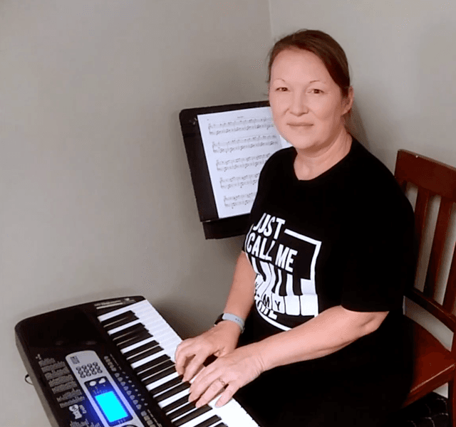 Michaela Teaching Piano