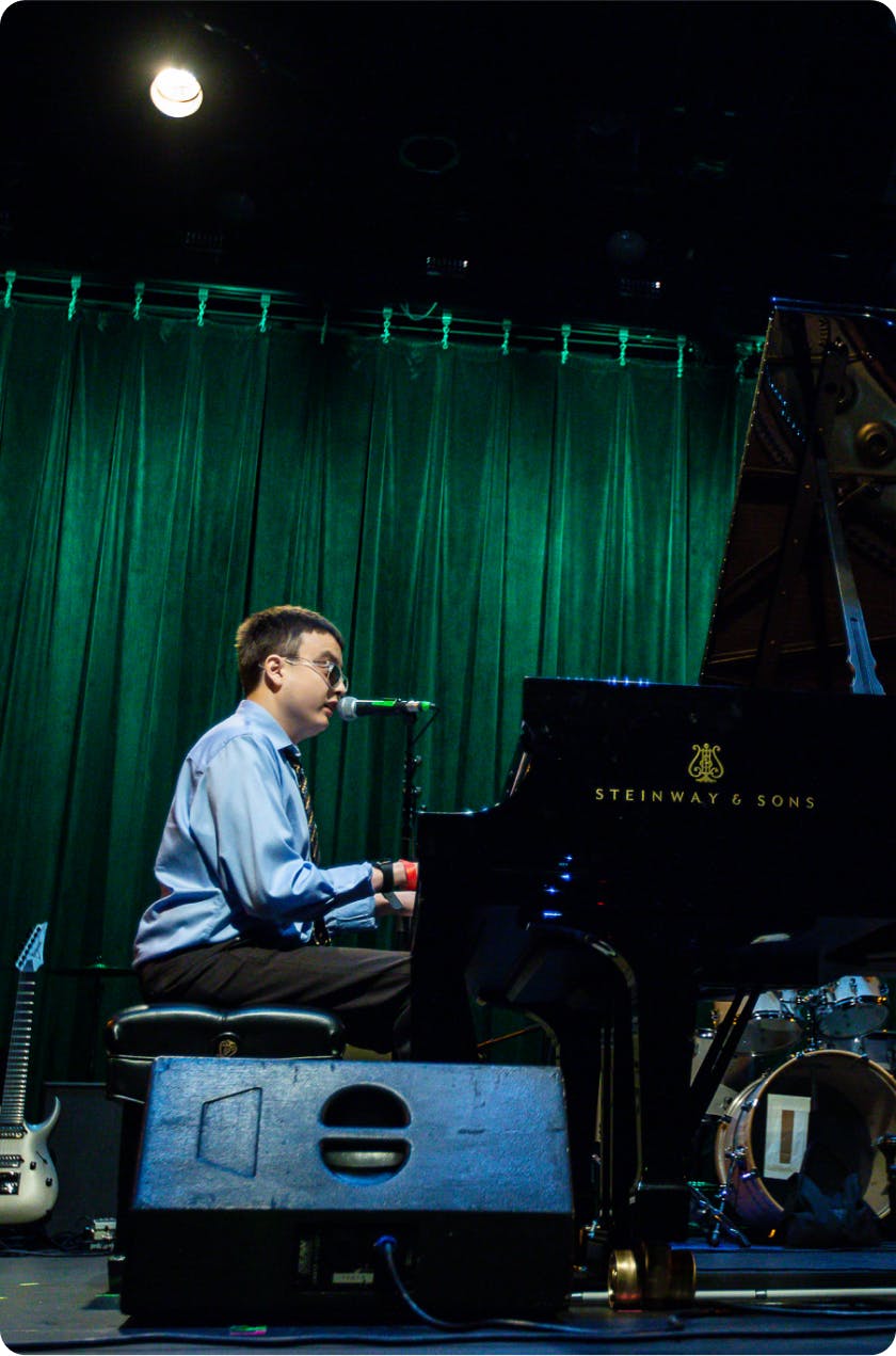 Devin Gutierrez plays the piano